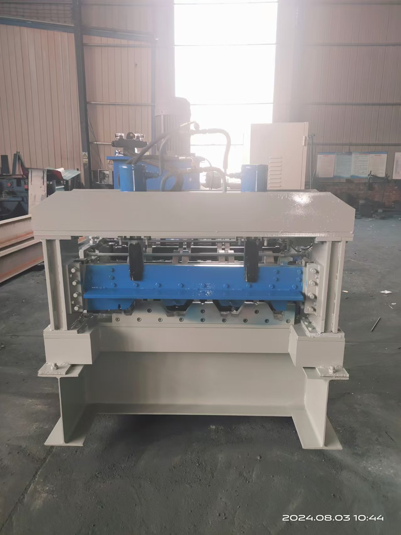 Galvanized sheet floor decking machine.